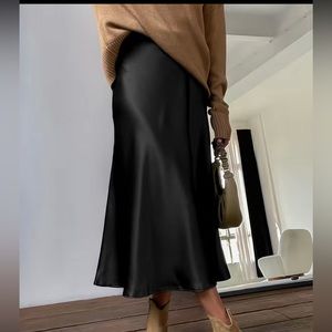 Black satin midi skirt
